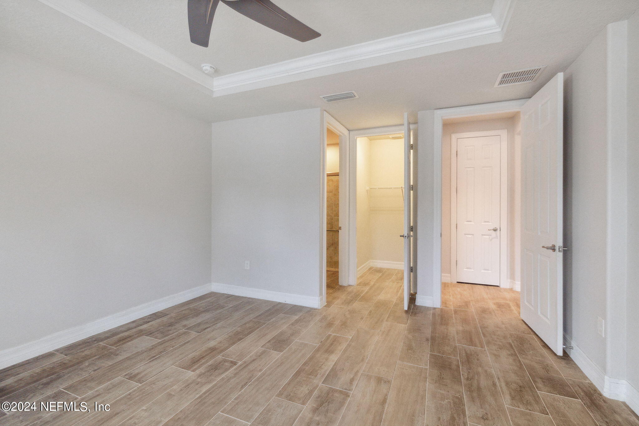 376 Eagle Pass Drive Ponte Vedra, FL 32081 - Photo 20 of 52 a view of an empty room with wooden floor