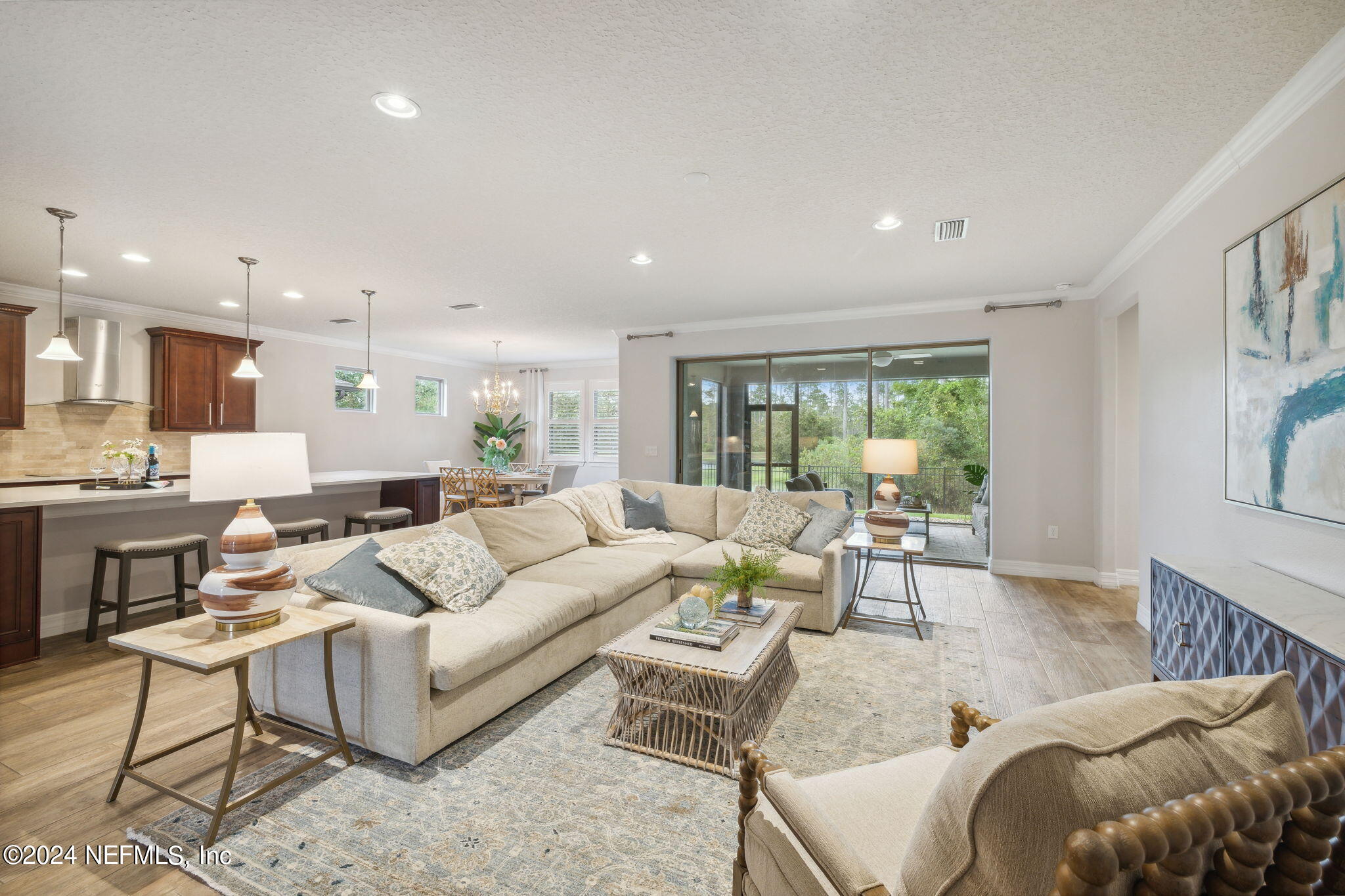 376 Eagle Pass Drive Ponte Vedra, FL 32081 - Photo 5 of 52 a living room with furniture and a large window