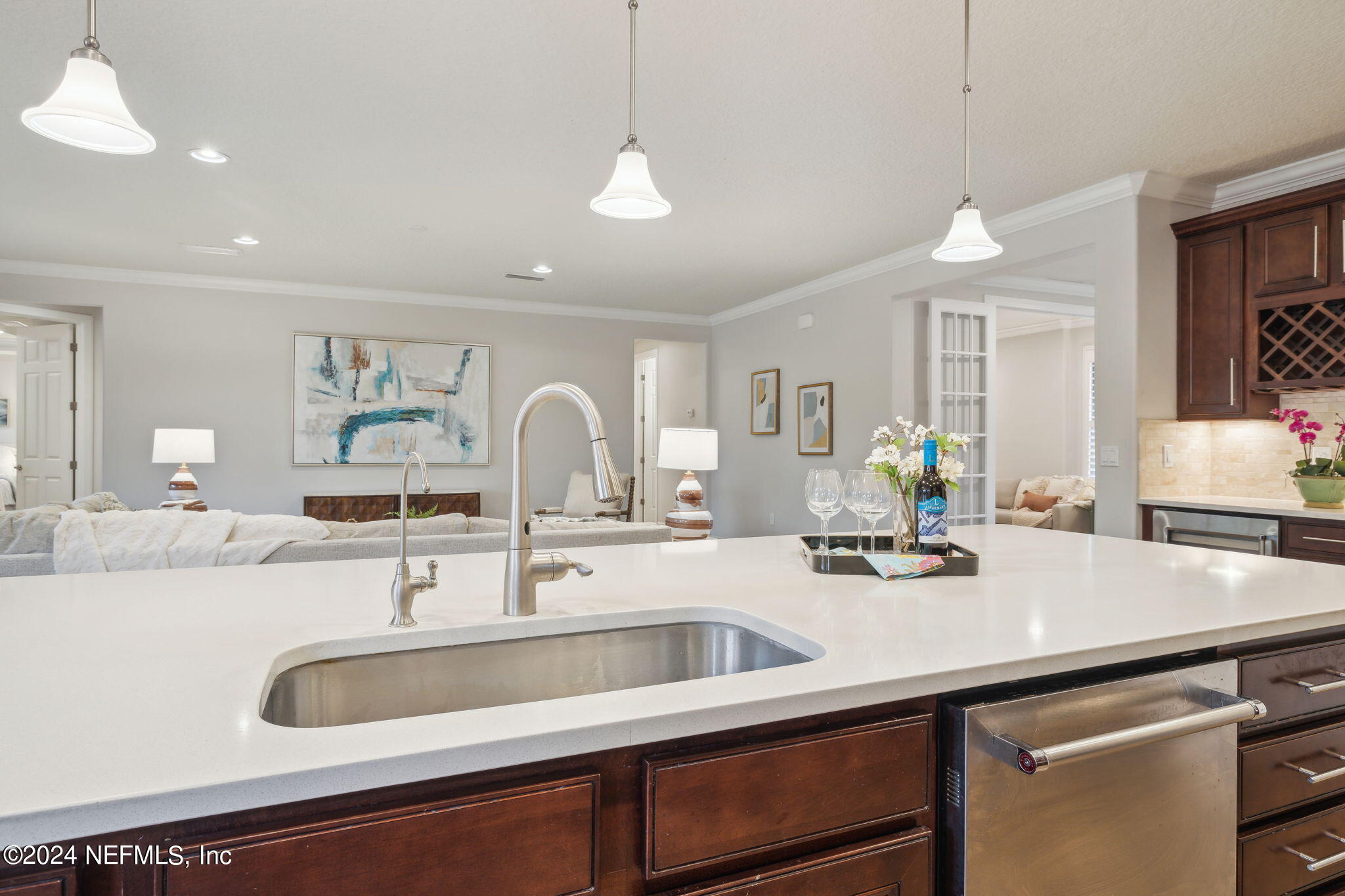 376 Eagle Pass Drive Ponte Vedra, FL 32081 - Photo 6 of 52 a kitchen with a sink and a refrigerator