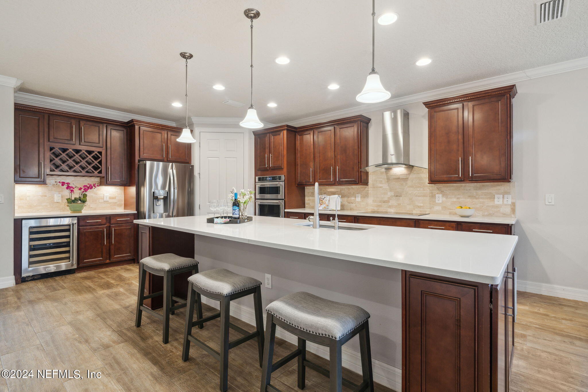 376 Eagle Pass Drive Ponte Vedra, FL 32081 - Photo 10 of 52 a large kitchen with a table and chairs in it