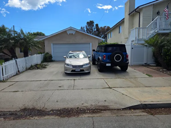 a view of a swimming pool with a table and chairs