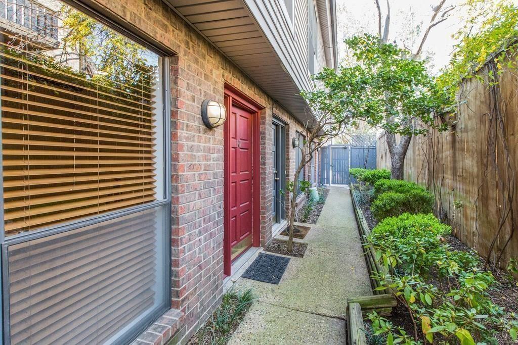 4411 Gilbert Avenue, Unit 10 Dallas, TX 75219 - Photo 11 of 11 a view of a pathway with a house