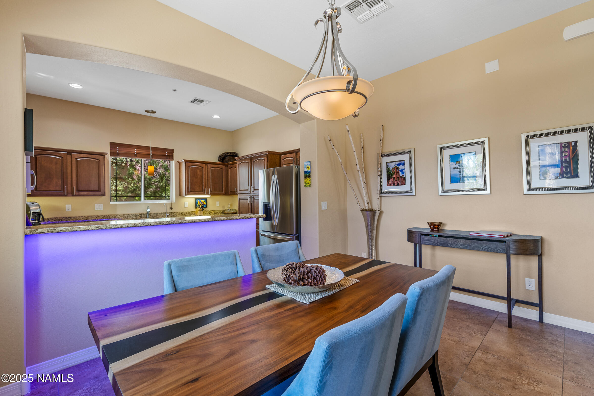 3239 Merryvale Lane Flagstaff, AZ 86005 - Photo 12 of 40 a view of a dining room with furniture