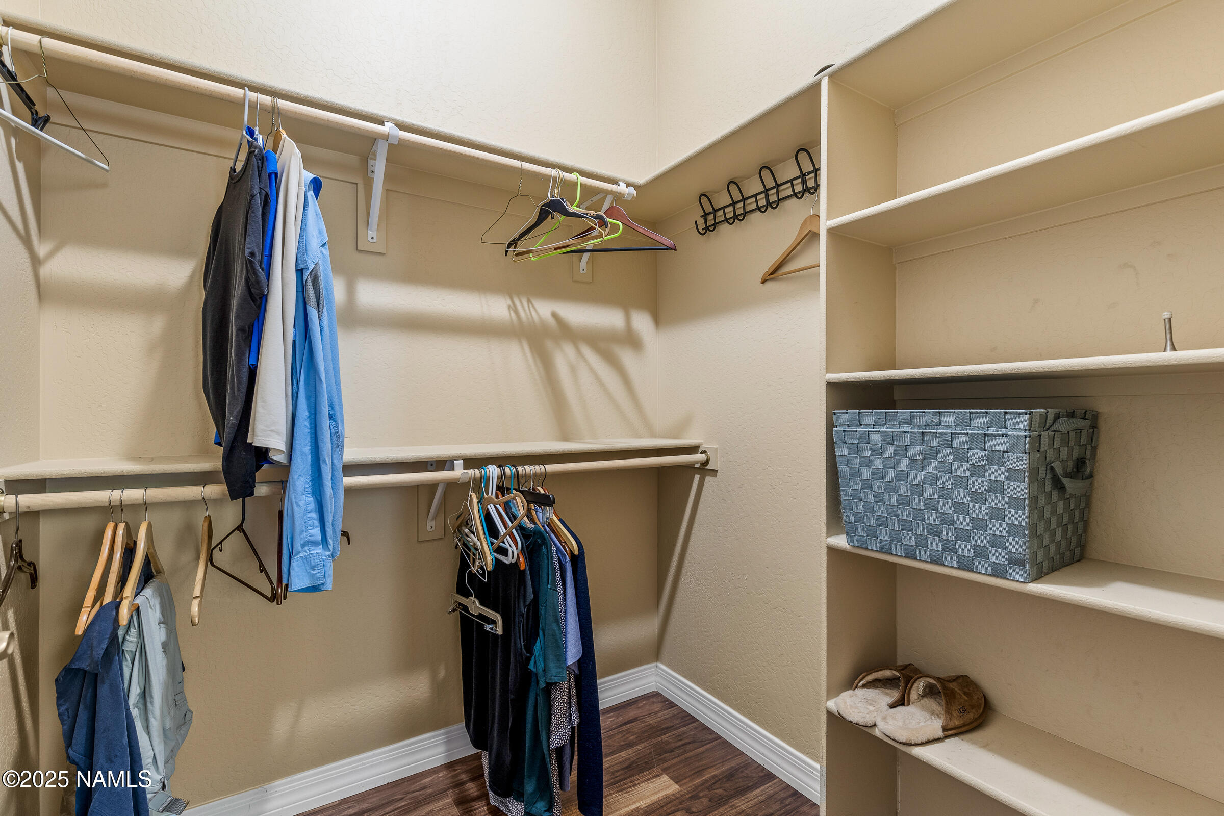 3239 Merryvale Lane Flagstaff, AZ 86005 - Photo 19 of 40 a view of walk in closet with clothes and shoes