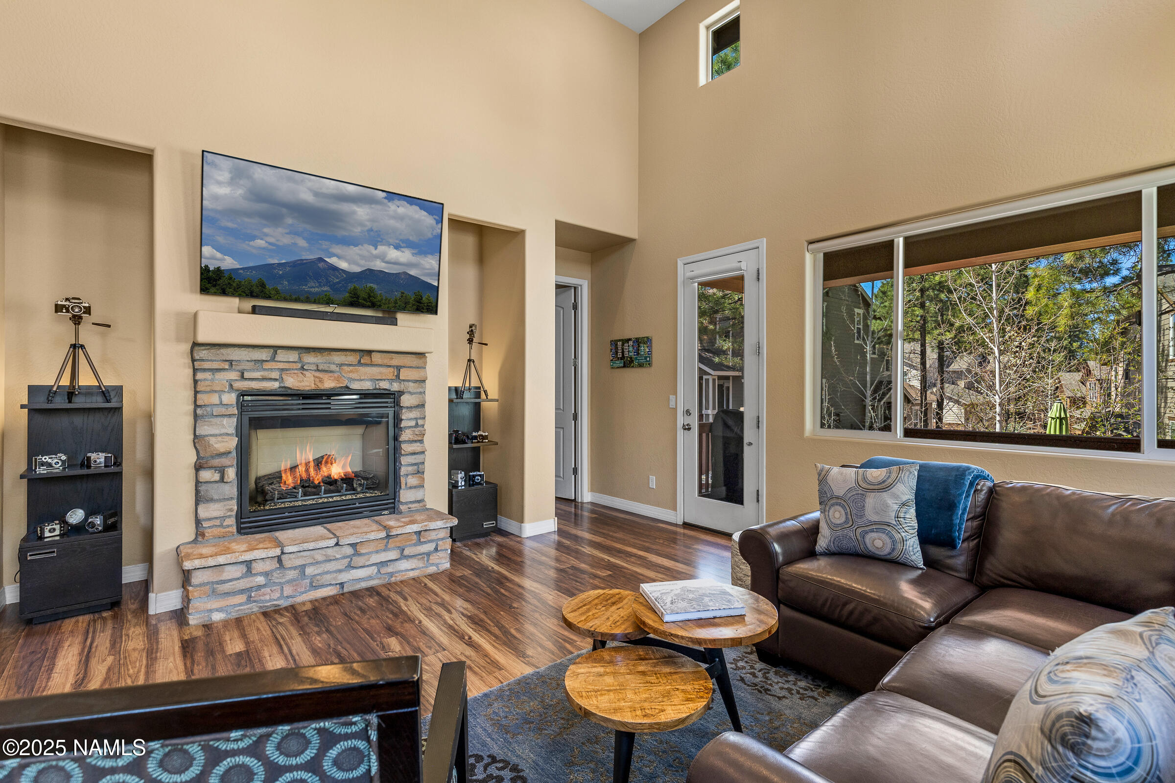 3239 Merryvale Lane Flagstaff, AZ 86005 - Photo 8 of 40 a living room with furniture and a fireplace