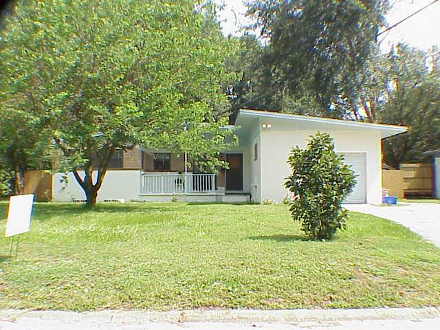 3663 Coronado Road Jacksonville, FL 32217 - Photo 1 of 1 a view of a house with backyard and a tree