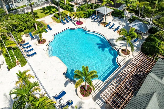 a view of a swimming pool with a patio