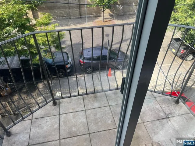 a view of entryway with a floor to ceiling window