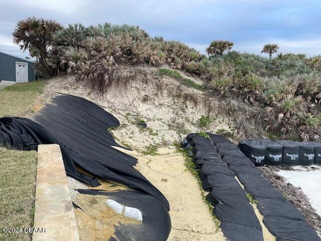 4415 South Atlantic Avenue Ponce Inlet, FL 32127 - Photo 3 of 14 a view of a yard with wooden fence