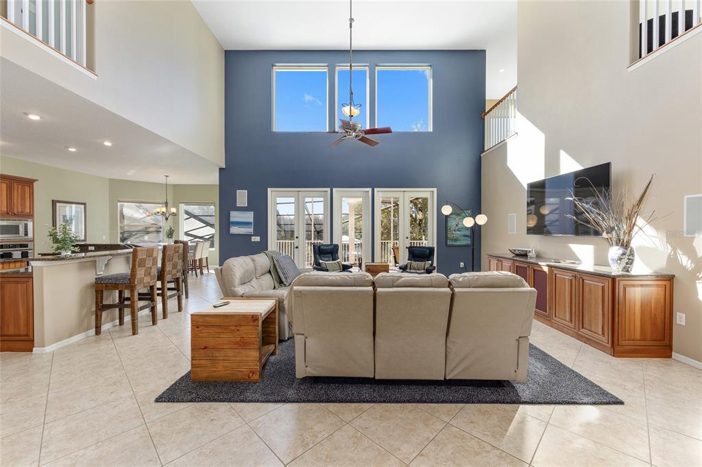 11944 West Creekside Lane Homosassa, FL 34448 - Photo 15 of 90 a living room with furniture a table and kitchen view