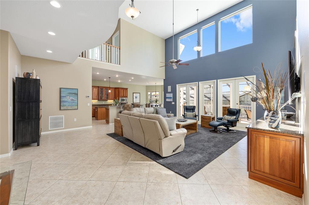 11944 West Creekside Lane Homosassa, FL 34448 - Photo 16 of 90 a living room with furniture and a large window
