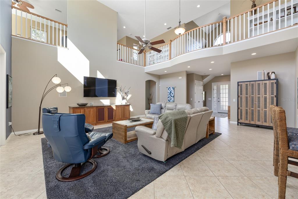11944 West Creekside Lane Homosassa, FL 34448 - Photo 18 of 90 a view of a livingroom with workspace and a window
