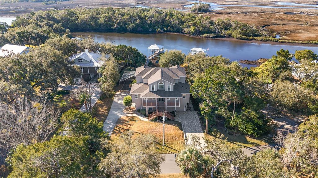 11944 West Creekside Lane Homosassa, FL 34448 - Photo 2 of 90 an aerial view of a house with a lake view