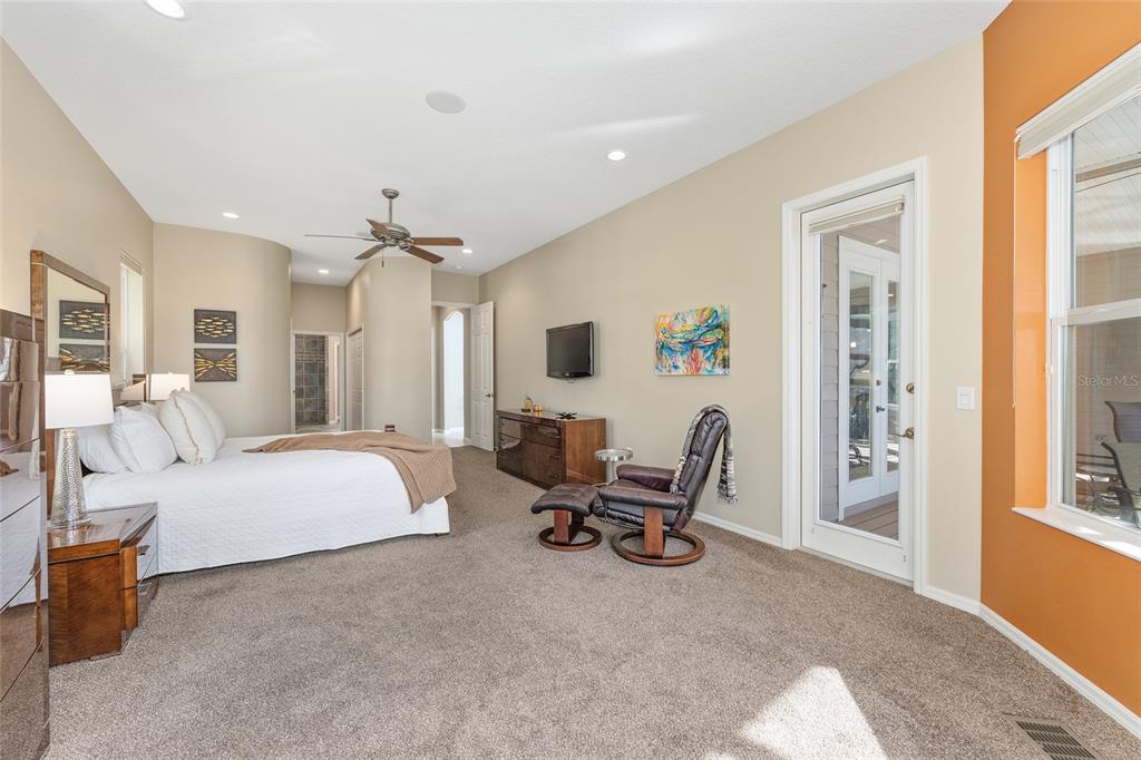 11944 West Creekside Lane Homosassa, FL 34448 - Photo 29 of 90 a bedroom with furniture and a window