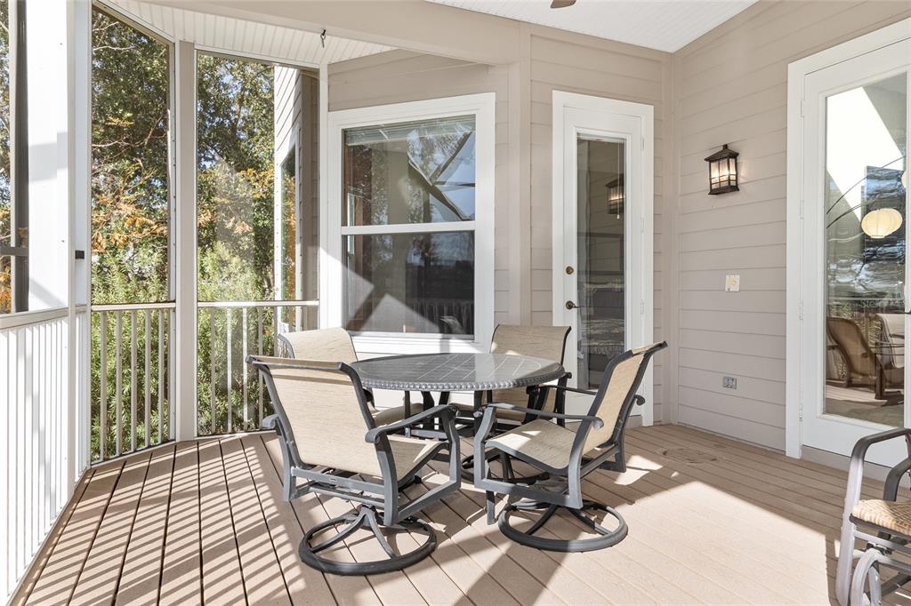 11944 West Creekside Lane Homosassa, FL 34448 - Photo 38 of 90 a view of a dining room with furniture and wooden floor