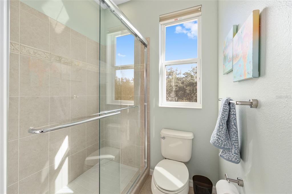 11944 West Creekside Lane Homosassa, FL 34448 - Photo 45 of 90 a bathroom with a toilet and a shower