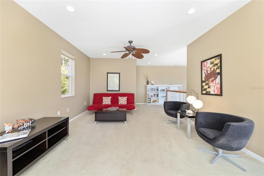 11944 West Creekside Lane Homosassa, FL 34448 - Photo 50 of 90 a living room with furniture and a flat screen tv