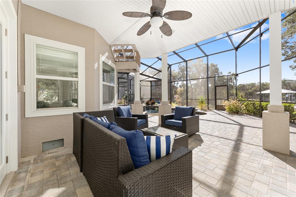 11944 West Creekside Lane Homosassa, FL 34448 - Photo 71 of 90 a living room with fireplace furniture and a large window