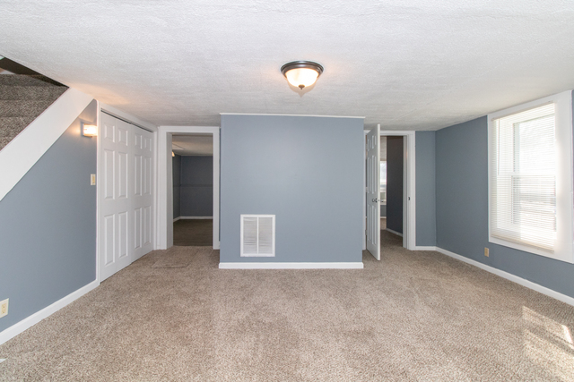 120 North Coolidge Street Normal, IL 61761 - Photo 2 of 21 a view of an empty room with a window