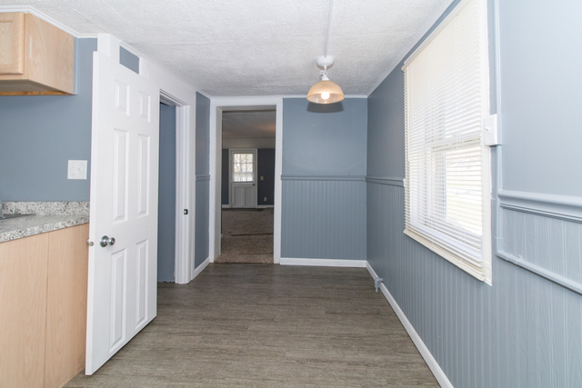 120 North Coolidge Street Normal, IL 61761 - Photo 11 of 21 wooden floor in an empty room with a window