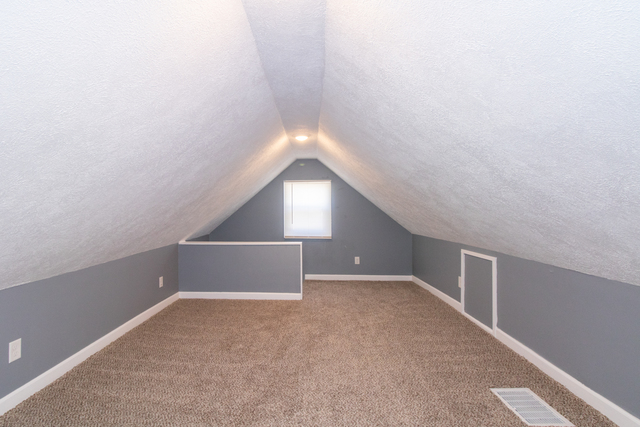 120 North Coolidge Street Normal, IL 61761 - Photo 16 of 21 a view of an empty room with windows
