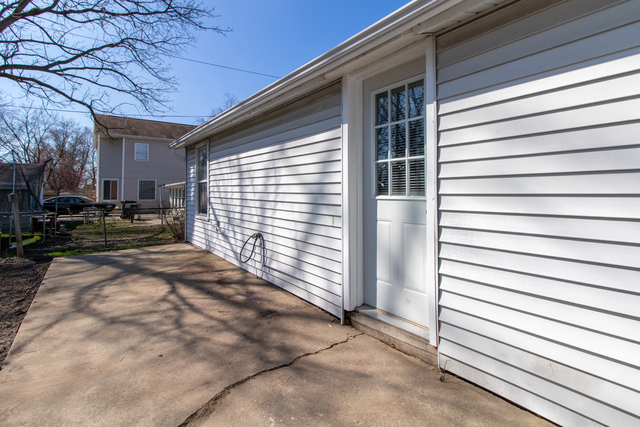 120 North Coolidge Street Normal, IL 61761 - Photo 18 of 21 a view of a house with a door and a yard