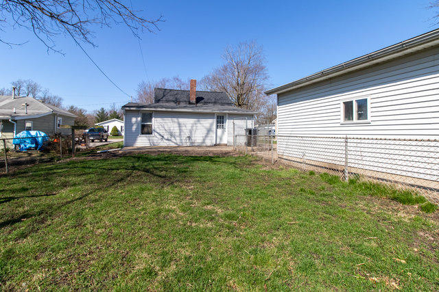 120 North Coolidge Street Normal, IL 61761 - Photo 20 of 21 a front view of a house with a yard