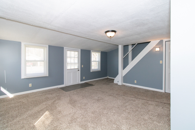 120 North Coolidge Street Normal, IL 61761 - Photo 3 of 21 a view of an empty room with windows