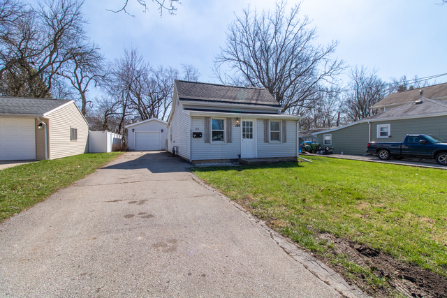 120 North Coolidge Street Normal, IL 61761 - Photo 21 of 21 a view of a house with a yard and large tree