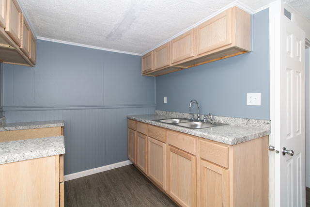 120 North Coolidge Street Normal, IL 61761 - Photo 8 of 21 a kitchen with stainless steel appliances granite countertop a sink and a cabinets