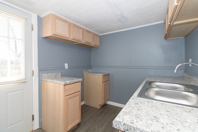 120 North Coolidge Street Normal, IL 61761 - Photo 9 of 21 a kitchen with a sink stove and cabinets