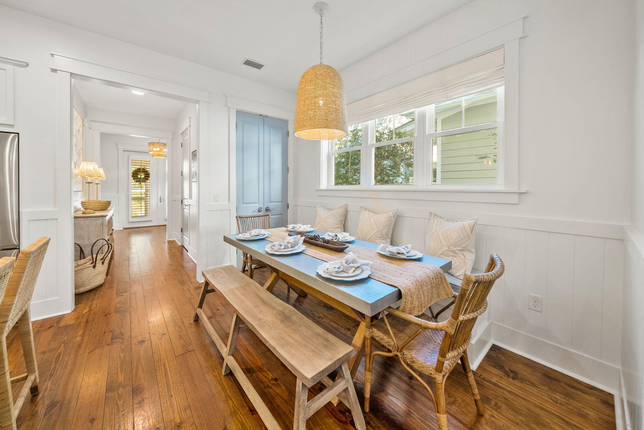 20 Beargrass Way Santa Rosa Beach, FL 32459 - Photo 11 of 50 a view of a dining room with furniture and wooden floor