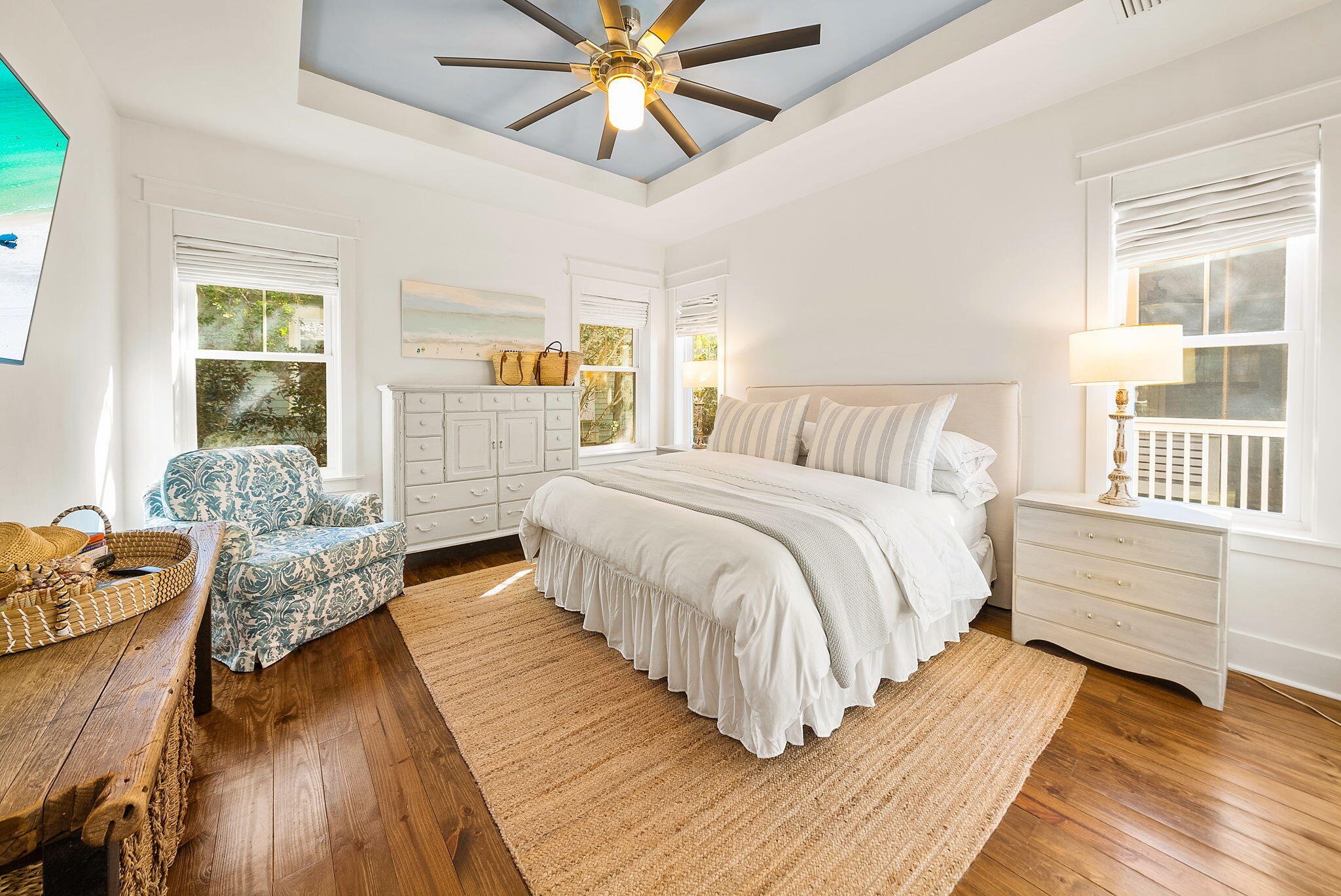 20 Beargrass Way Santa Rosa Beach, FL 32459 - Photo 15 of 50 a spacious bedroom with a bed and wooden floor