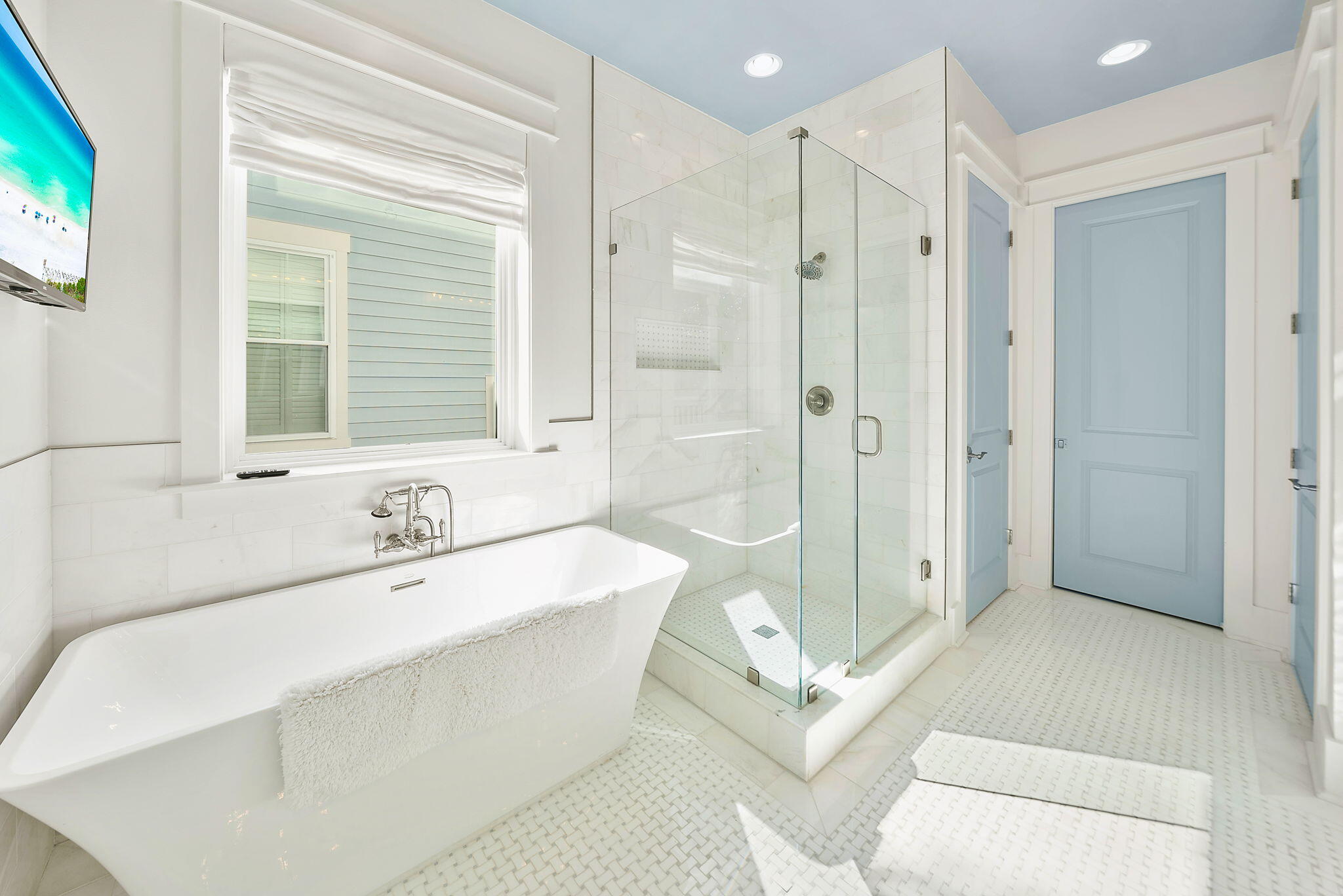 20 Beargrass Way Santa Rosa Beach, FL 32459 - Photo 16 of 50 a spacious bathroom with a tub shower sink and mirror