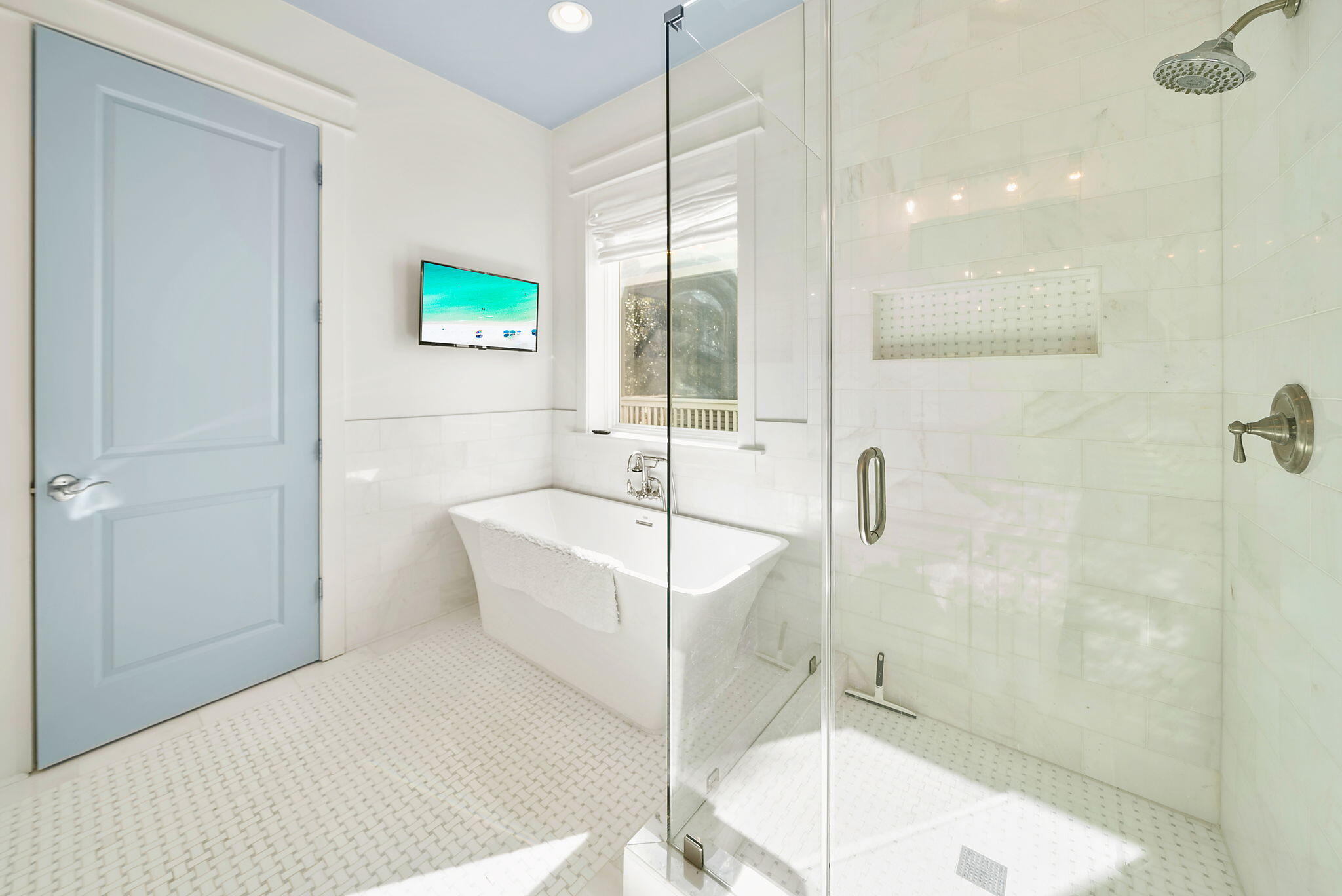 20 Beargrass Way Santa Rosa Beach, FL 32459 - Photo 18 of 50 a bathroom with a bathtub and a shower