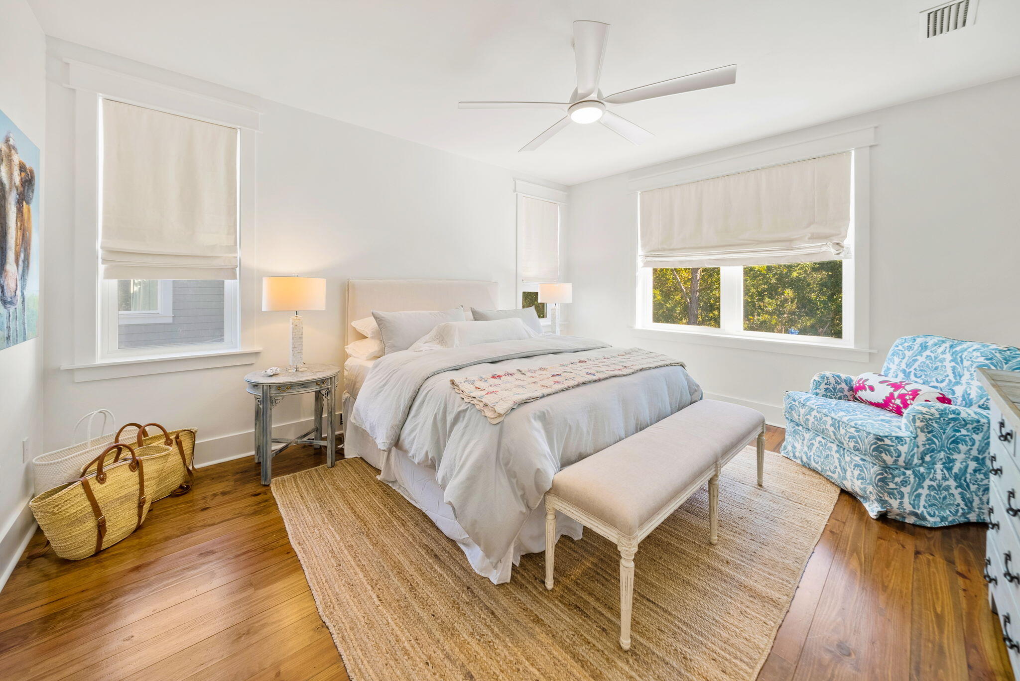 20 Beargrass Way Santa Rosa Beach, FL 32459 - Photo 32 of 50 a bedroom with a bed and wooden floor