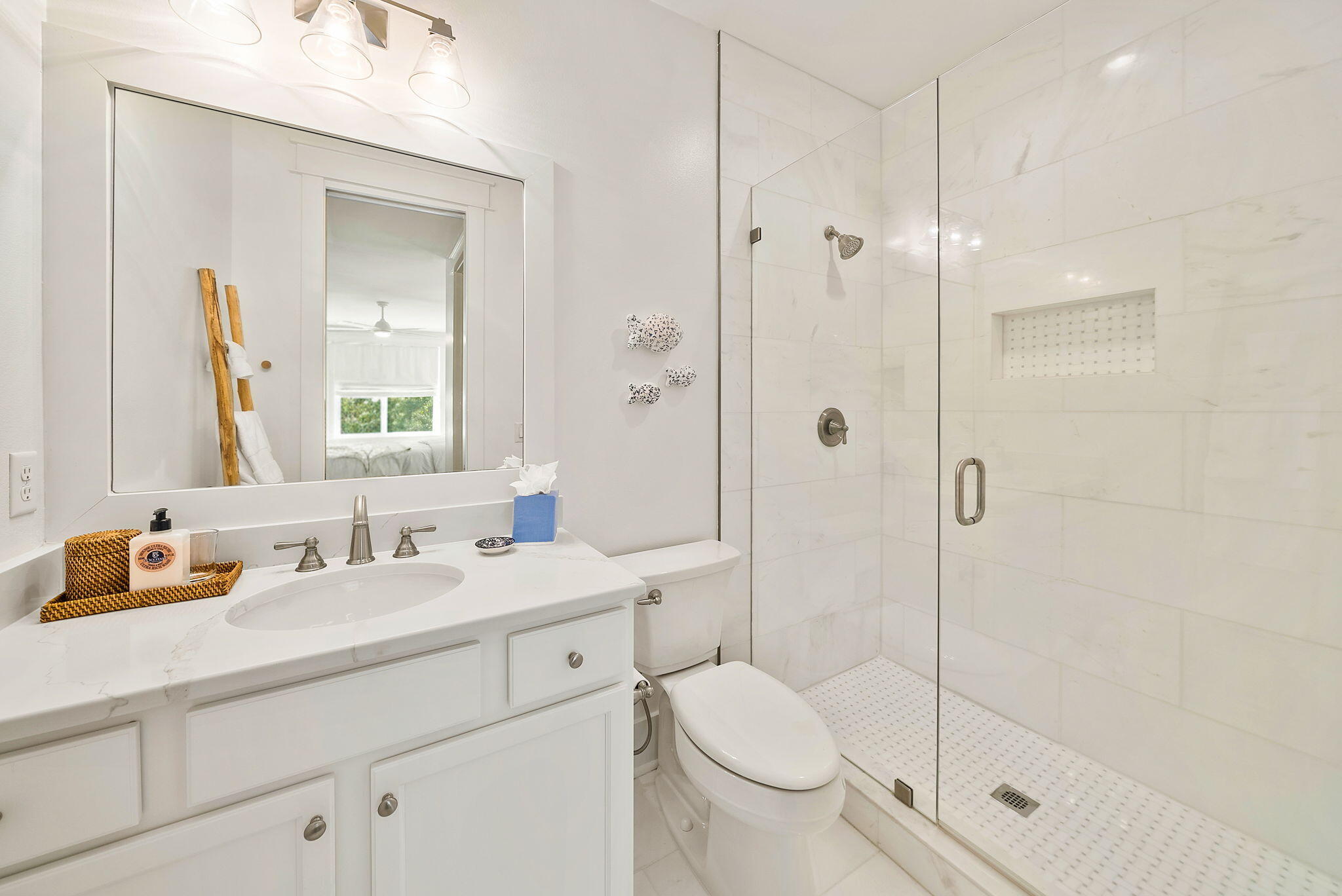 20 Beargrass Way Santa Rosa Beach, FL 32459 - Photo 34 of 50 a bathroom with a sink a toilet and shower