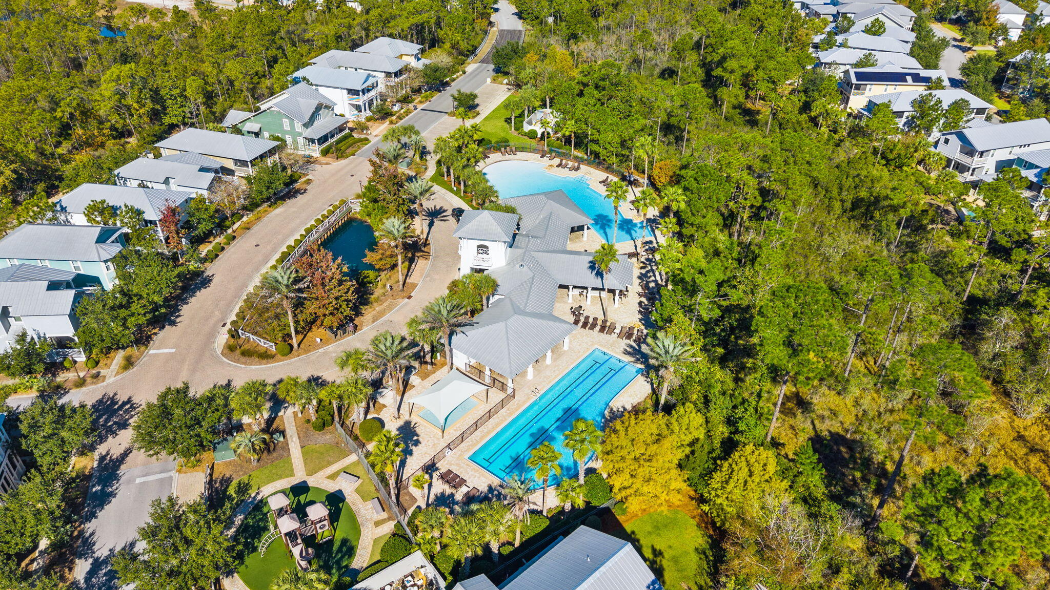 20 Beargrass Way Santa Rosa Beach, FL 32459 - Photo 43 of 50 an aerial view of a house with a yard and garden