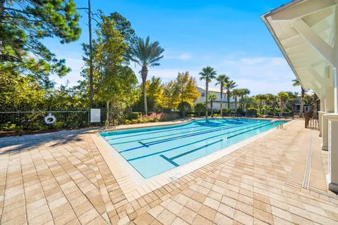 a view of a swimming pool with a patio