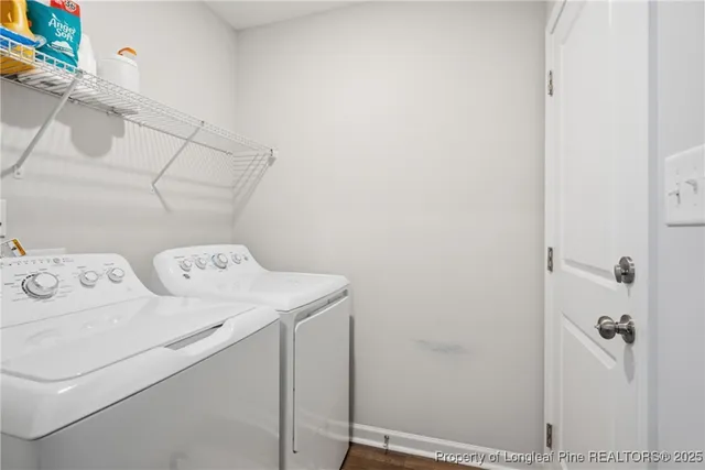 a bedroom with a bed and a night stand