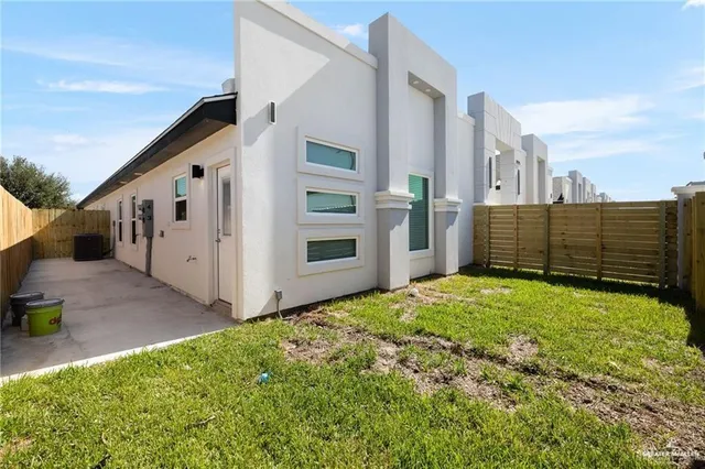 a view of a back yard of the house