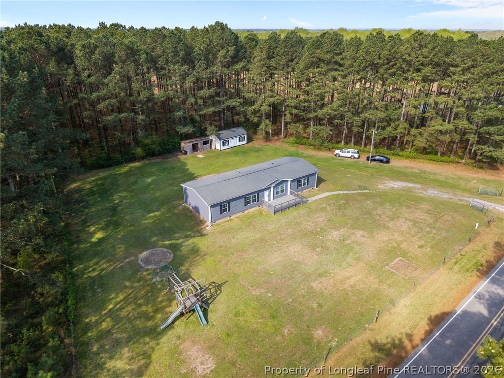 2252 Old Stage Road South Erwin, NC 28339 - Photo 42 of 47 a view of a swimming pool with a yard