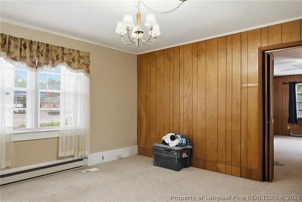 a kitchen with stainless steel appliances a refrigerator sink and cabinets