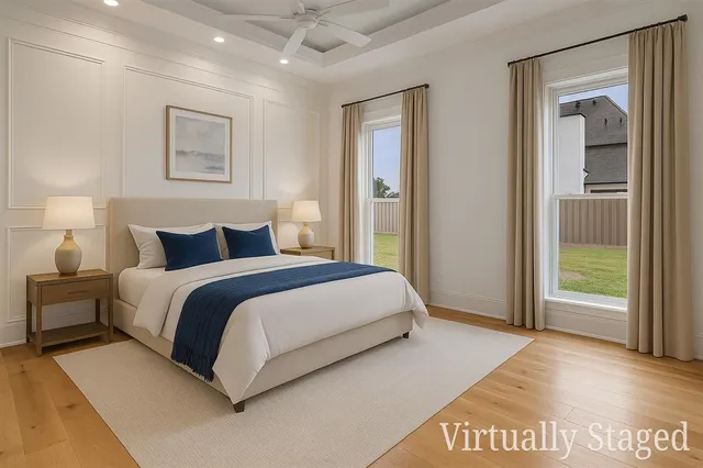 a open white kitchen with cabinets