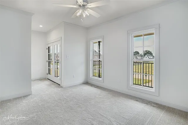 a bathroom with a toilet and a bathtub