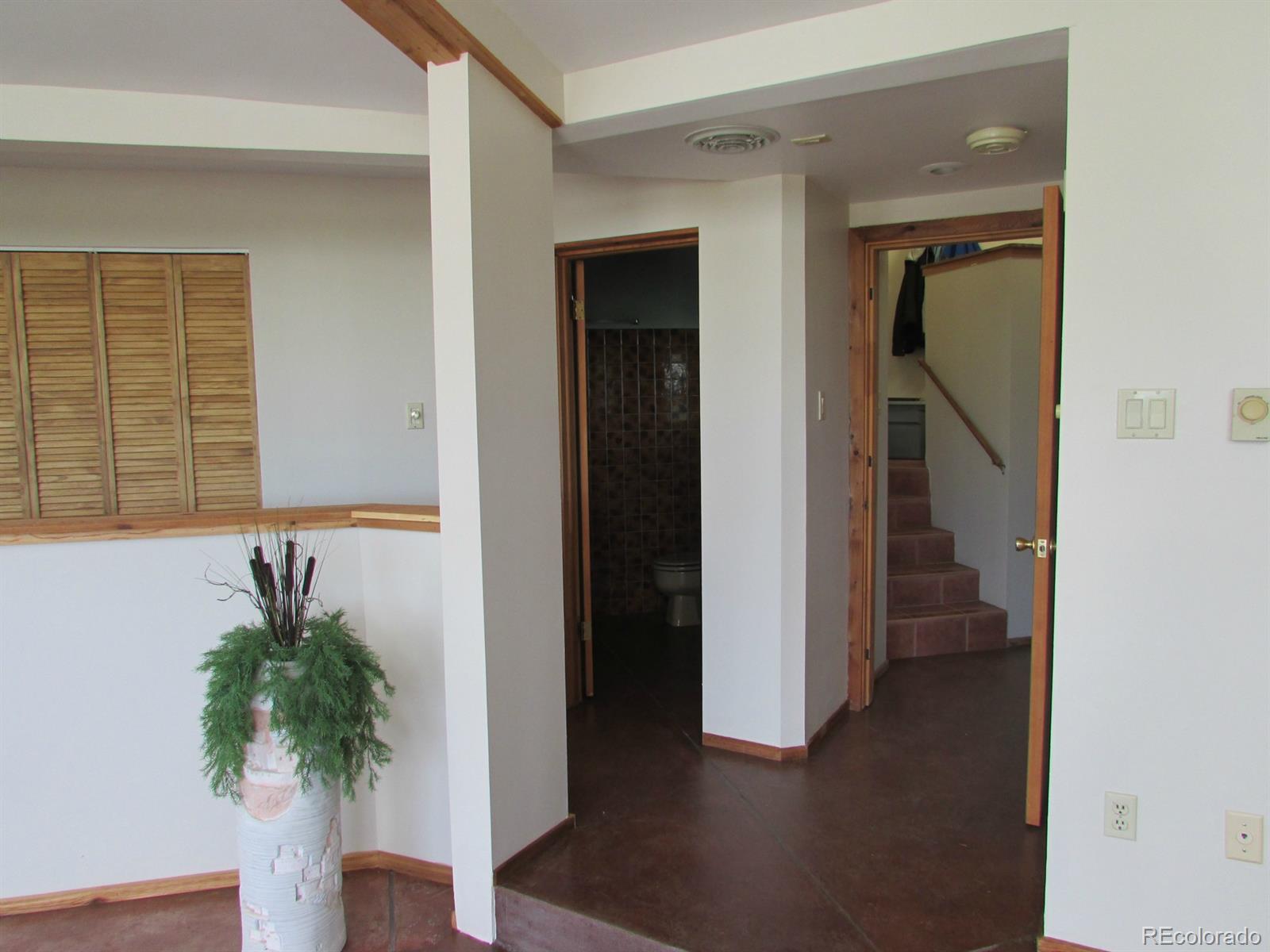 5410 Hunt Place Rye, CO 81069 - Photo 7 of 22 a view of entryway with wooden floor