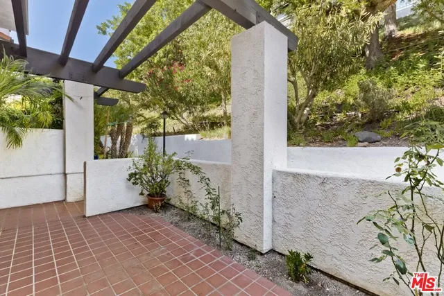 a view of a back yard of the house