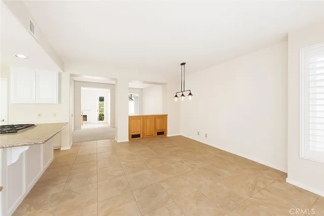 a view of a kitchen with a sink
