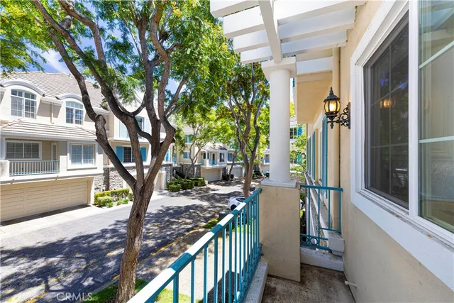a view of a house with a tree