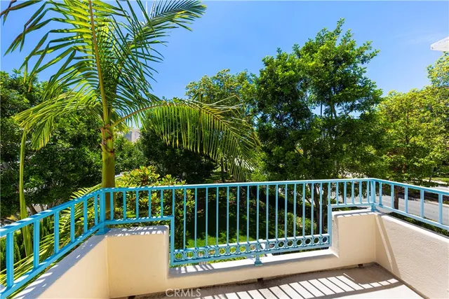 a view of a white roof and wooden fence
